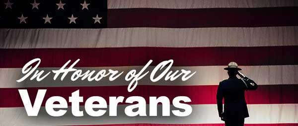 American Flag with Soldier Saluting and the words In Honor of our Veterans